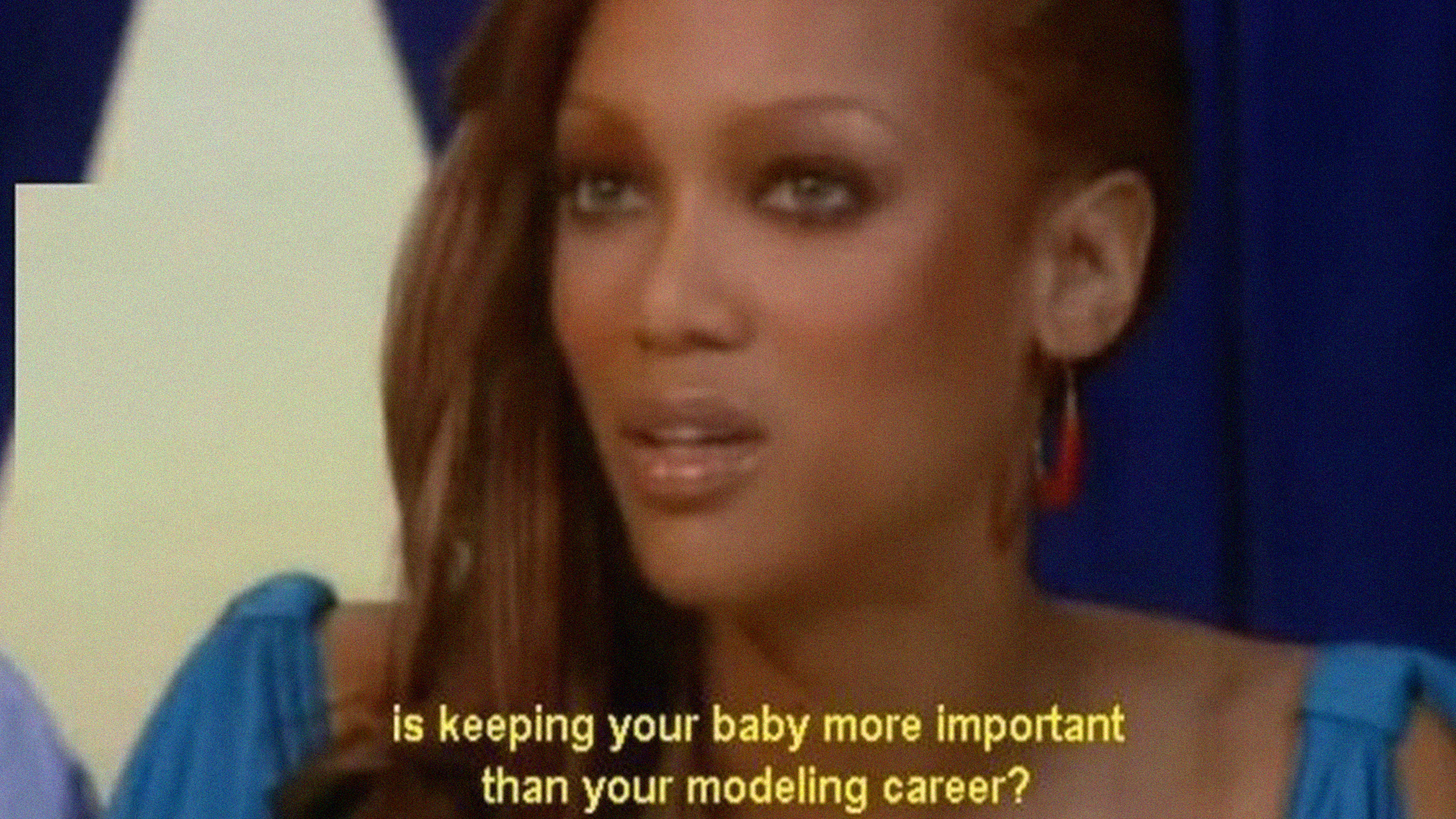 tyra banks with the words "is keeping your baby more important than your modeling career" over her, caption-style