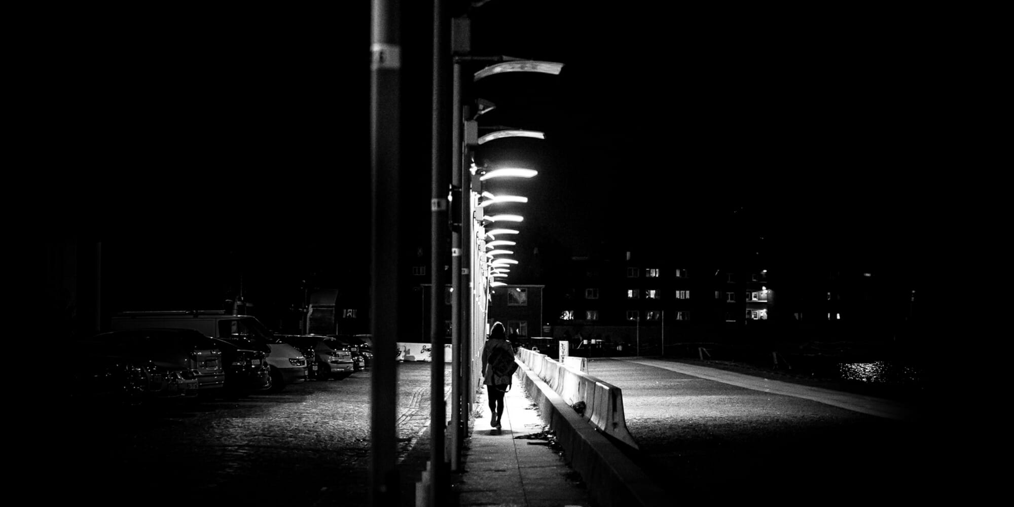 Woman walks alone at night. One activist asked women to open up about what they would do if men had a curfew at 9pm.