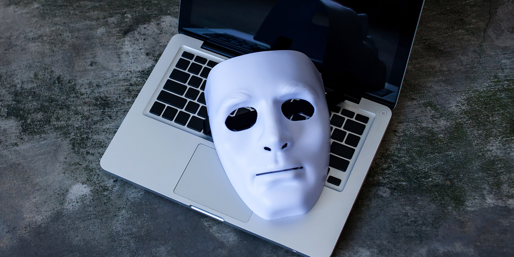 white mask on top of keyboard