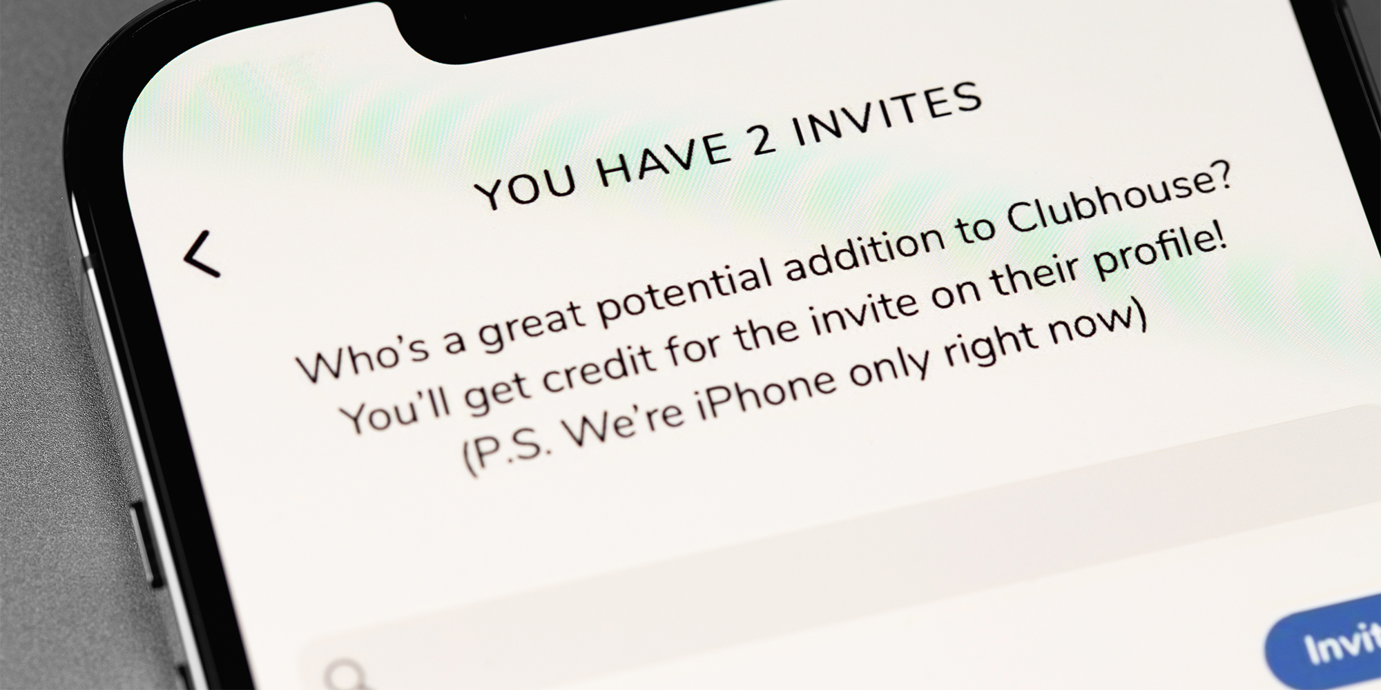 iPhone with "You have 2 invites. Who's a great potential addition to Clubhouse? You'll get credit for the invite on their profile! (P.S. We're iPhone only right now)" message