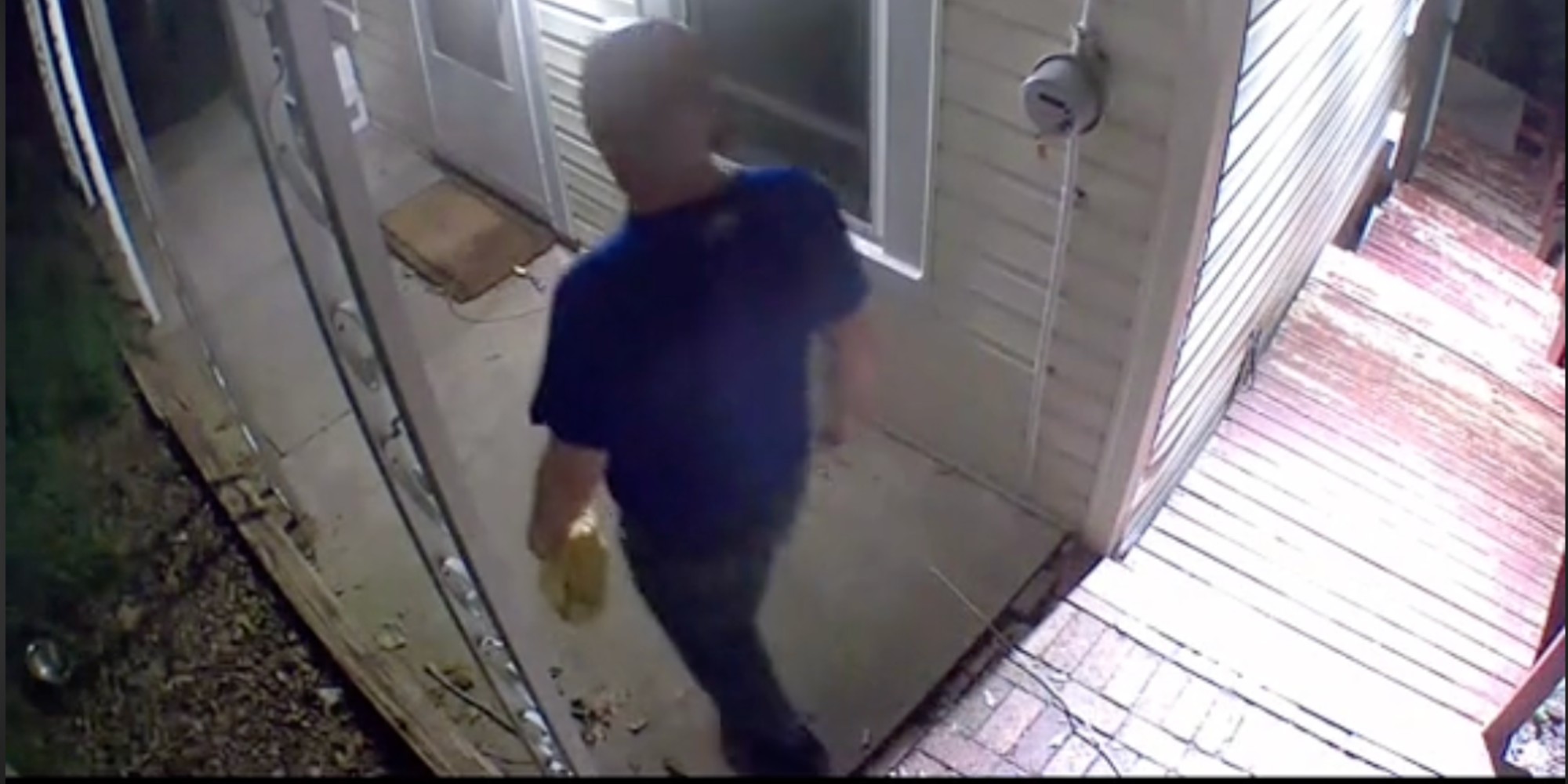 man walking around woman's house