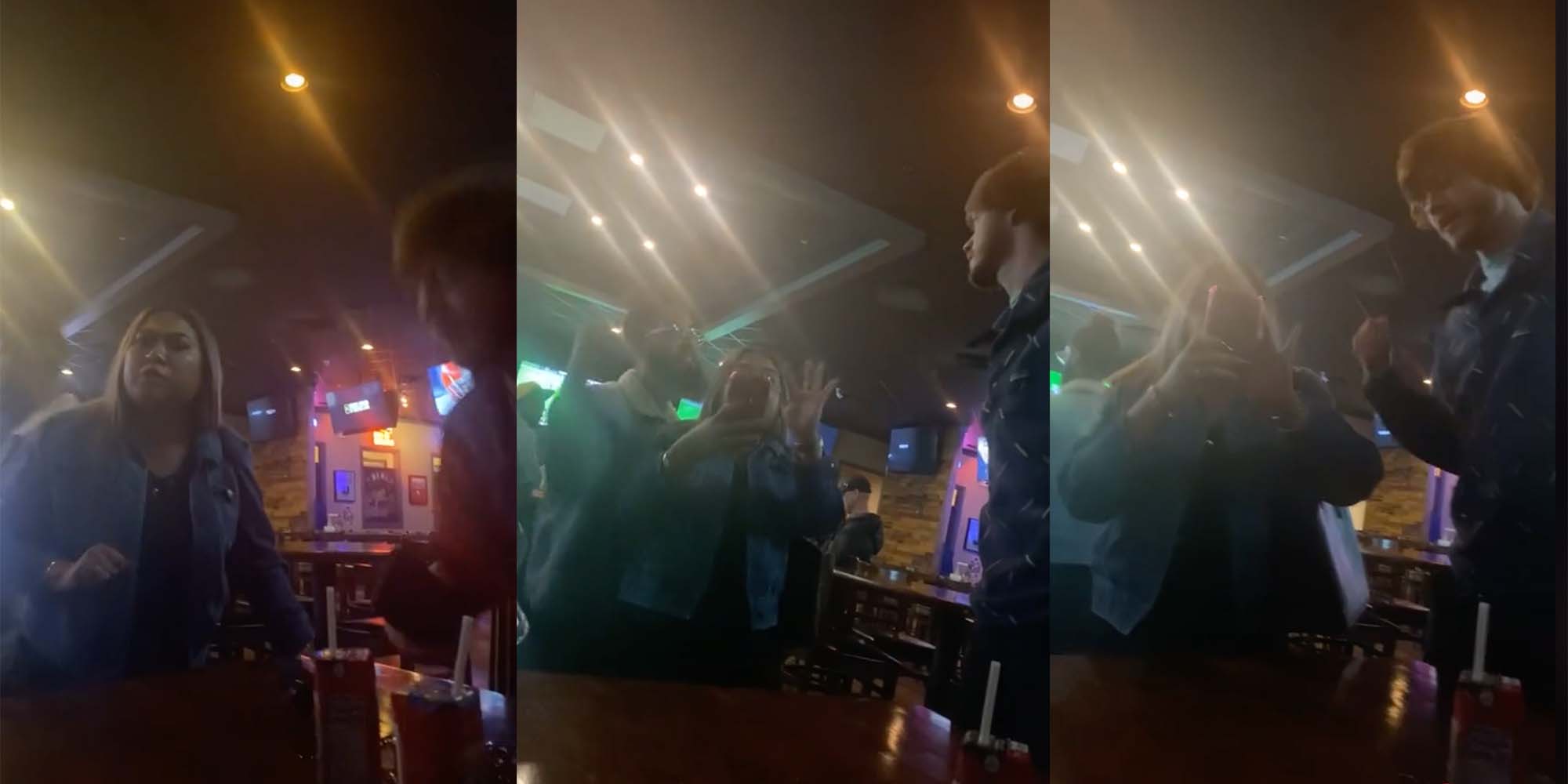 After a woman swipes at someone's phone, she drops her own.