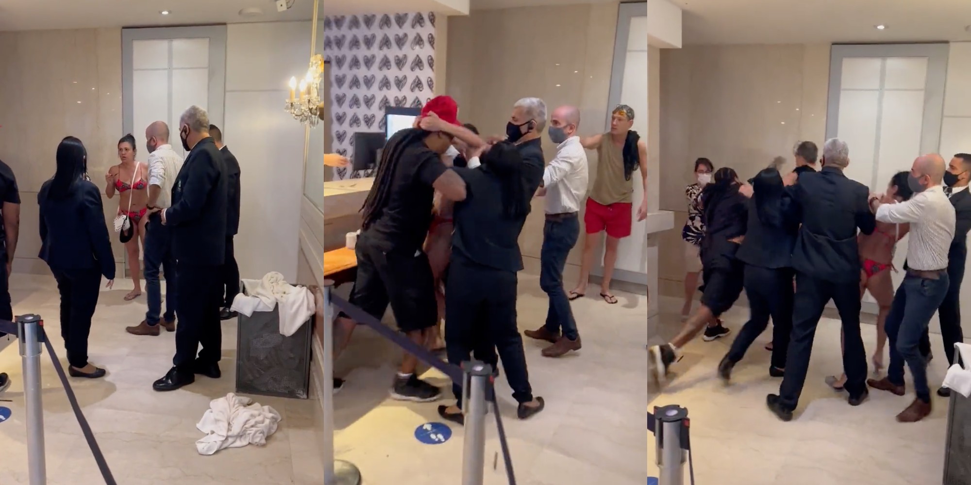 A white woman pulls Black man by the head.