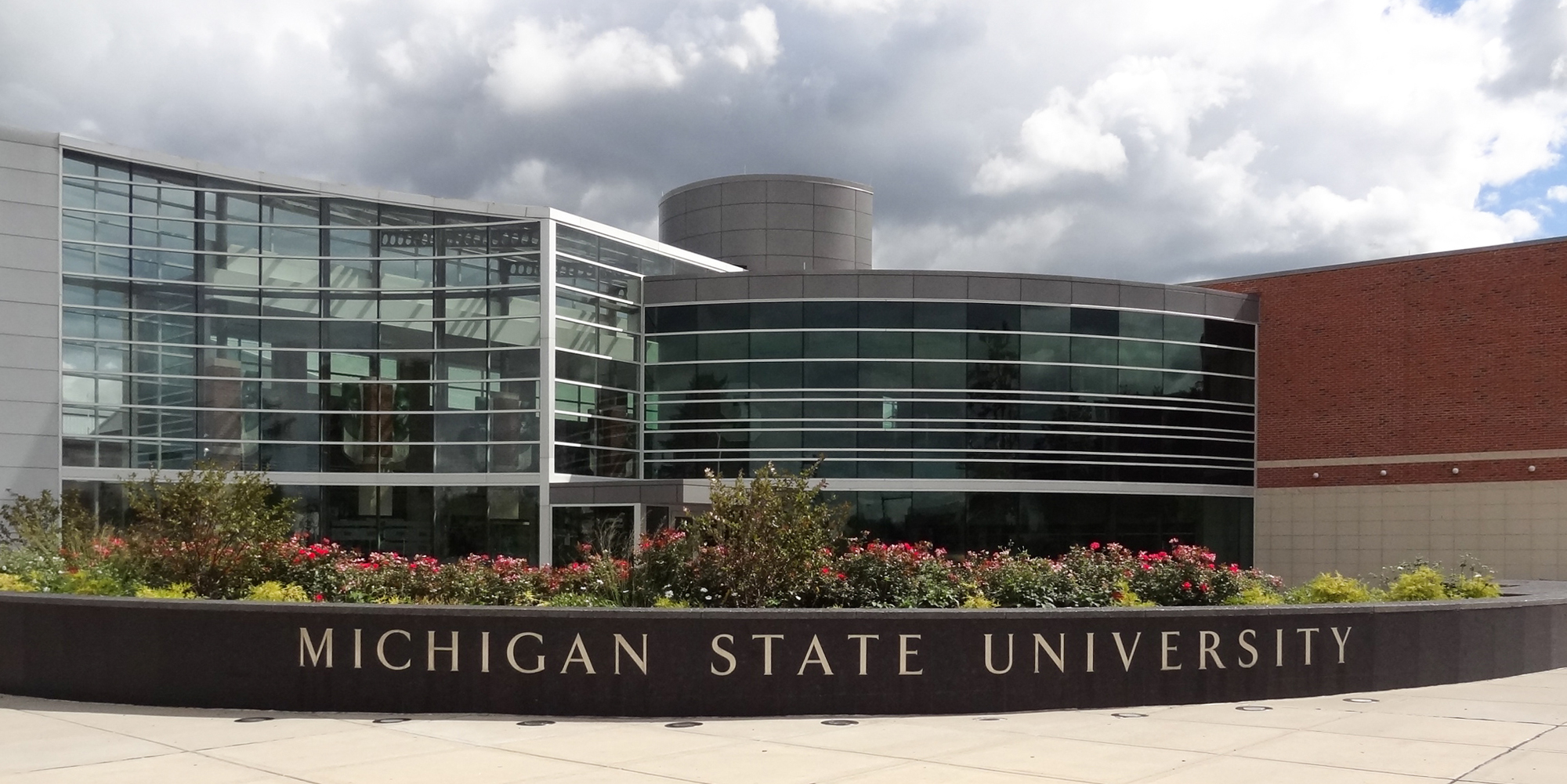 Michigan State University with sign