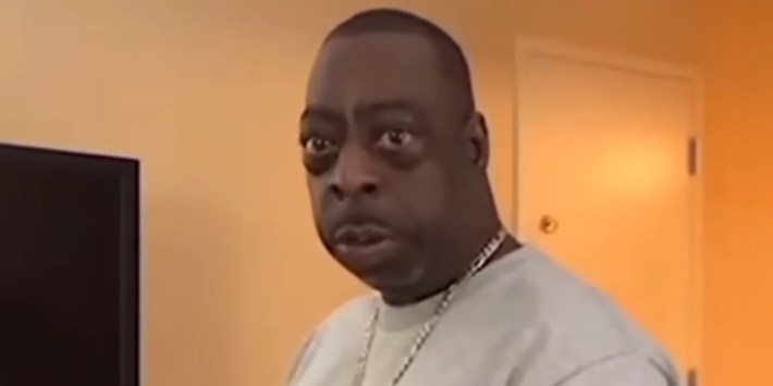 Just hanging around meme: Beetlejuice speaking in front of tan walls and door