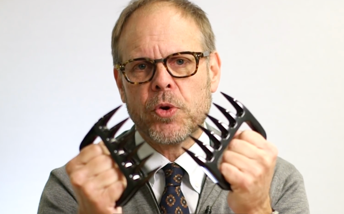 alton brown holding meat claws