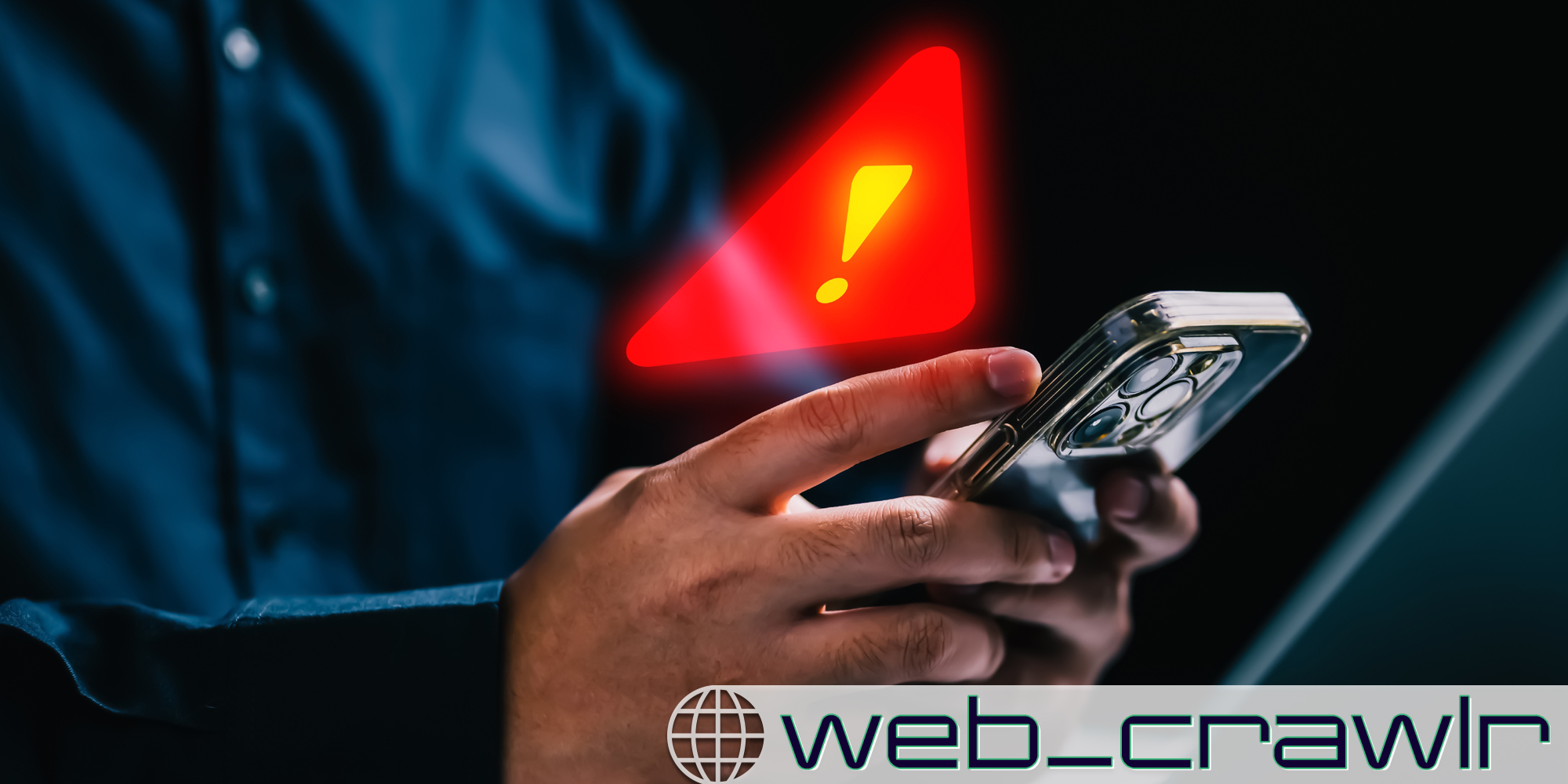 A person holding a phone with a warning sign above it. The Daily Dot newsletter web_crawlr logo is in the bottom right corner.
