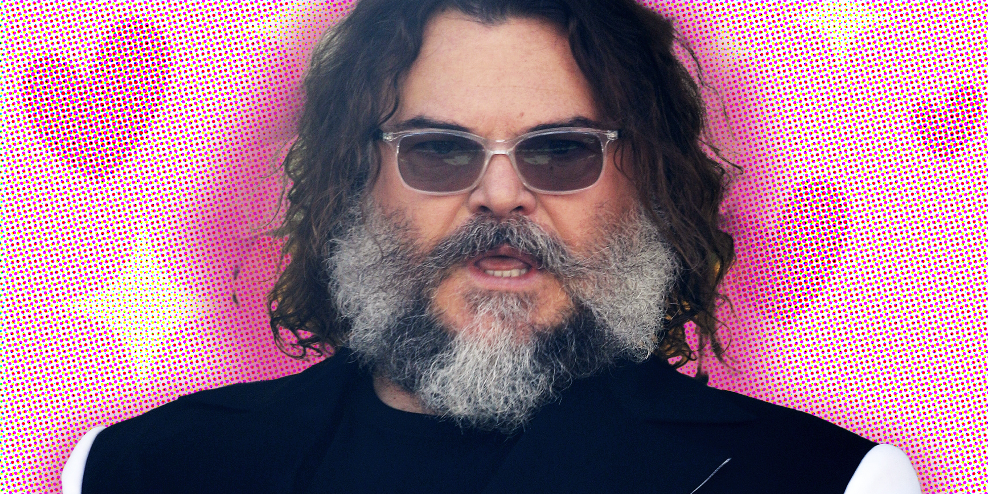 Jack Black in front of heart background