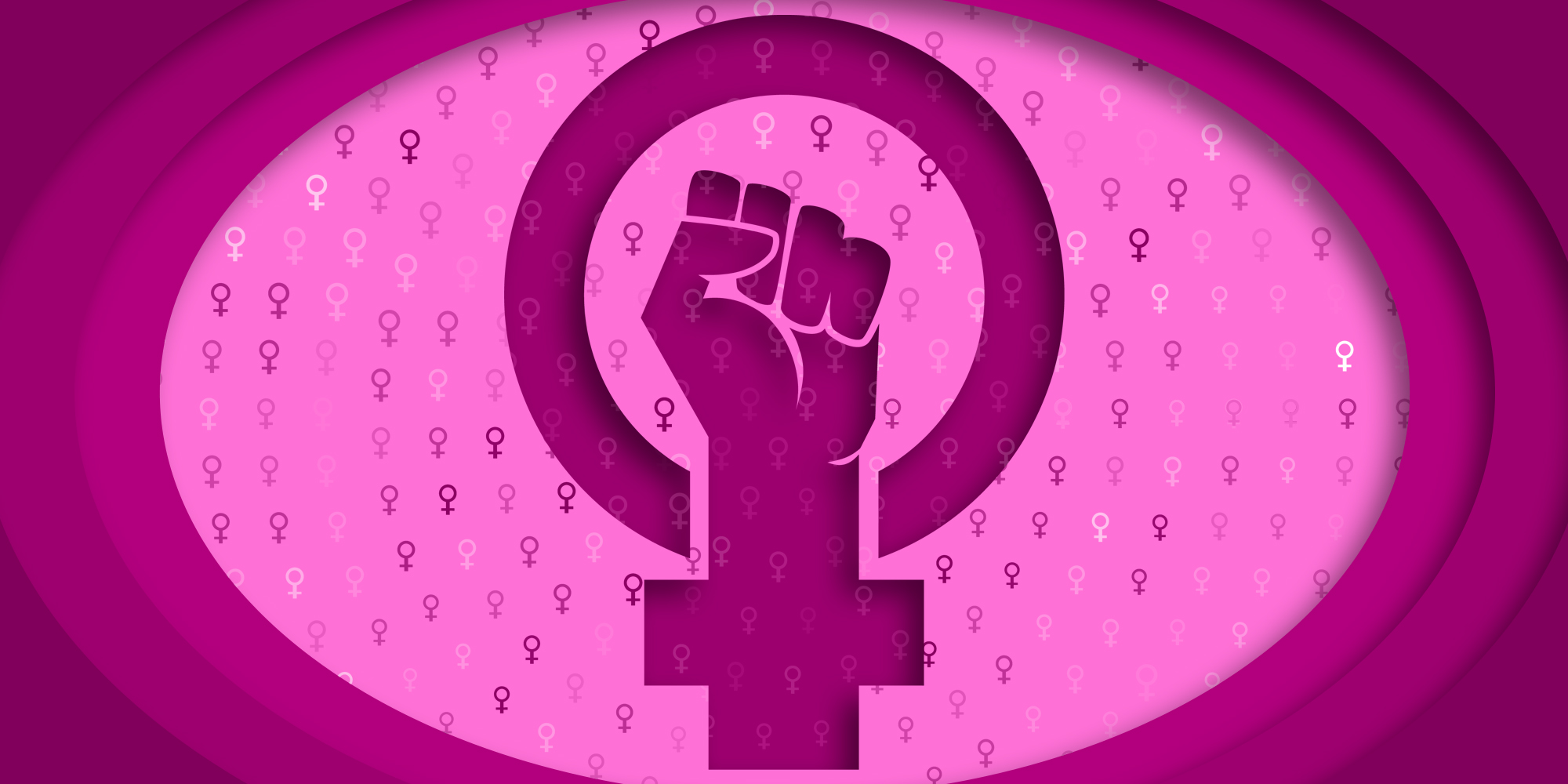 paper cutout of female symbol with power fist in the center