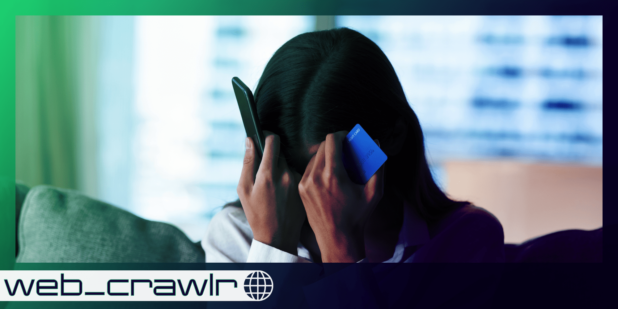 A person looking frustrated while holding a phone and credit card. The Daily Dot newsletter web_crawlr logo is in the bottom left corner.