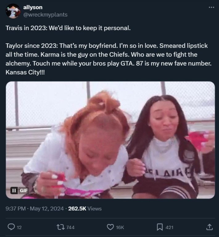 spit take gif in a tweet with the caption "Travis in 2023: We’d like to keep it personal.Taylor since 2023: That’s my boyfriend. I’m so in love. Smeared lipstick all the time. Karma is the guy on the Chiefs. Who are we to fight the alchemy. Touch me while your bros play GTA. 87 is my new fave number. Kansas City!!!"