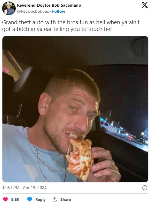 tweet with photo of a man eating pizza with the caption "Grand theft auto with the bros fun as hell when ya ain’t got a bitch in ya ear telling you to touch her"