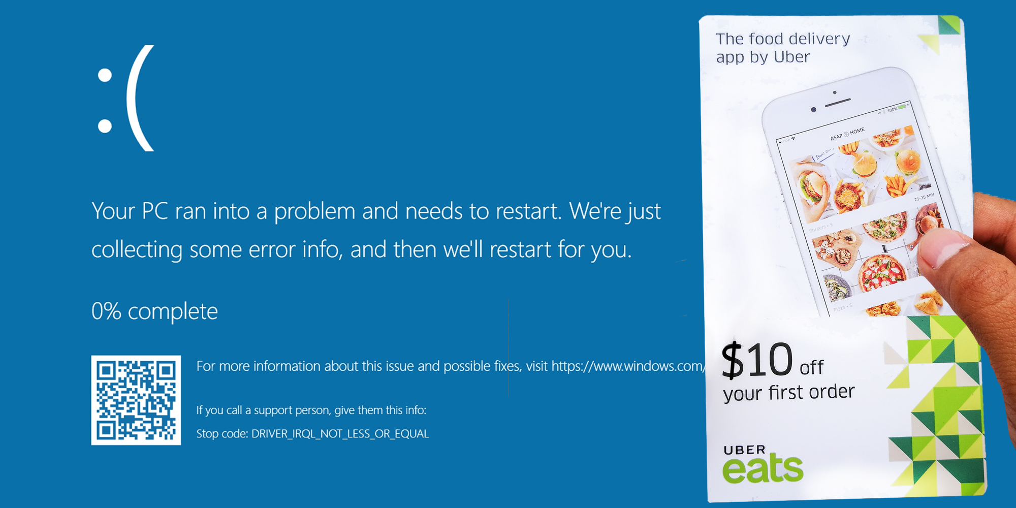 Hand Holding ubereats gift card over microsoft blue screen of death