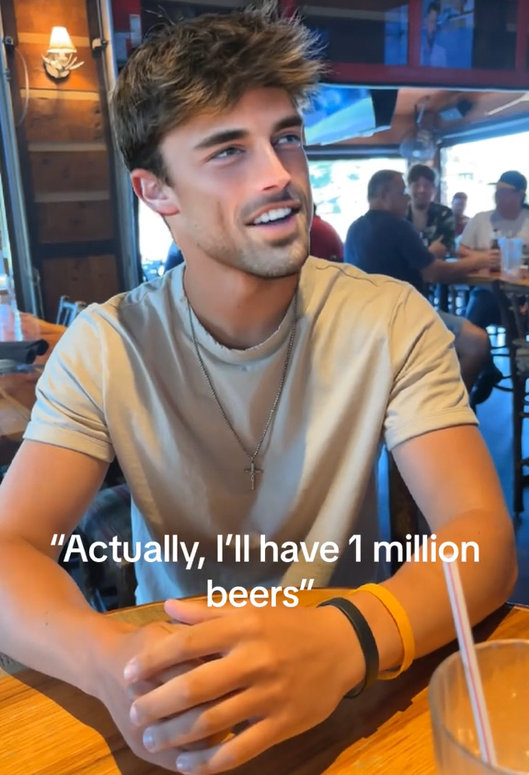 Handsome man saying "Actually, I'll have 1 million beers."