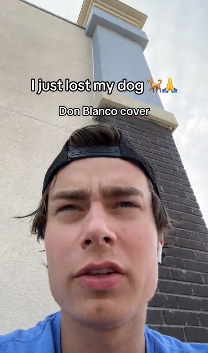 Close up view of a man in a backwards cap sitting next to a building. Text overlay reads, "I just lots my dog. Don Blanco cover."