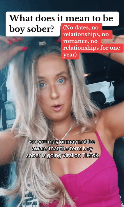 A blonde woman sitting in her car. Text overlay reads, "What does it mean to be boy sober? (No dates, no relationships, no romance, no relationships for one year)" and the caption reads, "so you may or may not be aware that the term boy sober is going viral on TikTok."