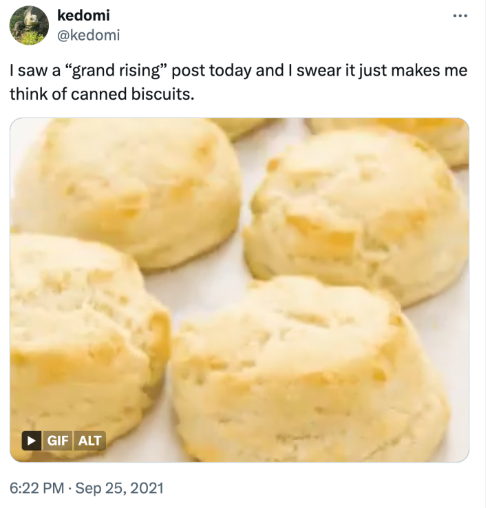 Tweet reads, "I saw a 'grand rising' post today and I swear it just makes me think of canned biscuits." with an image of biscuits rising in the oven.