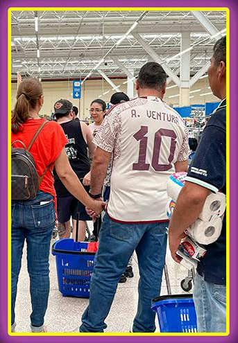 A person waiting in a check out line.