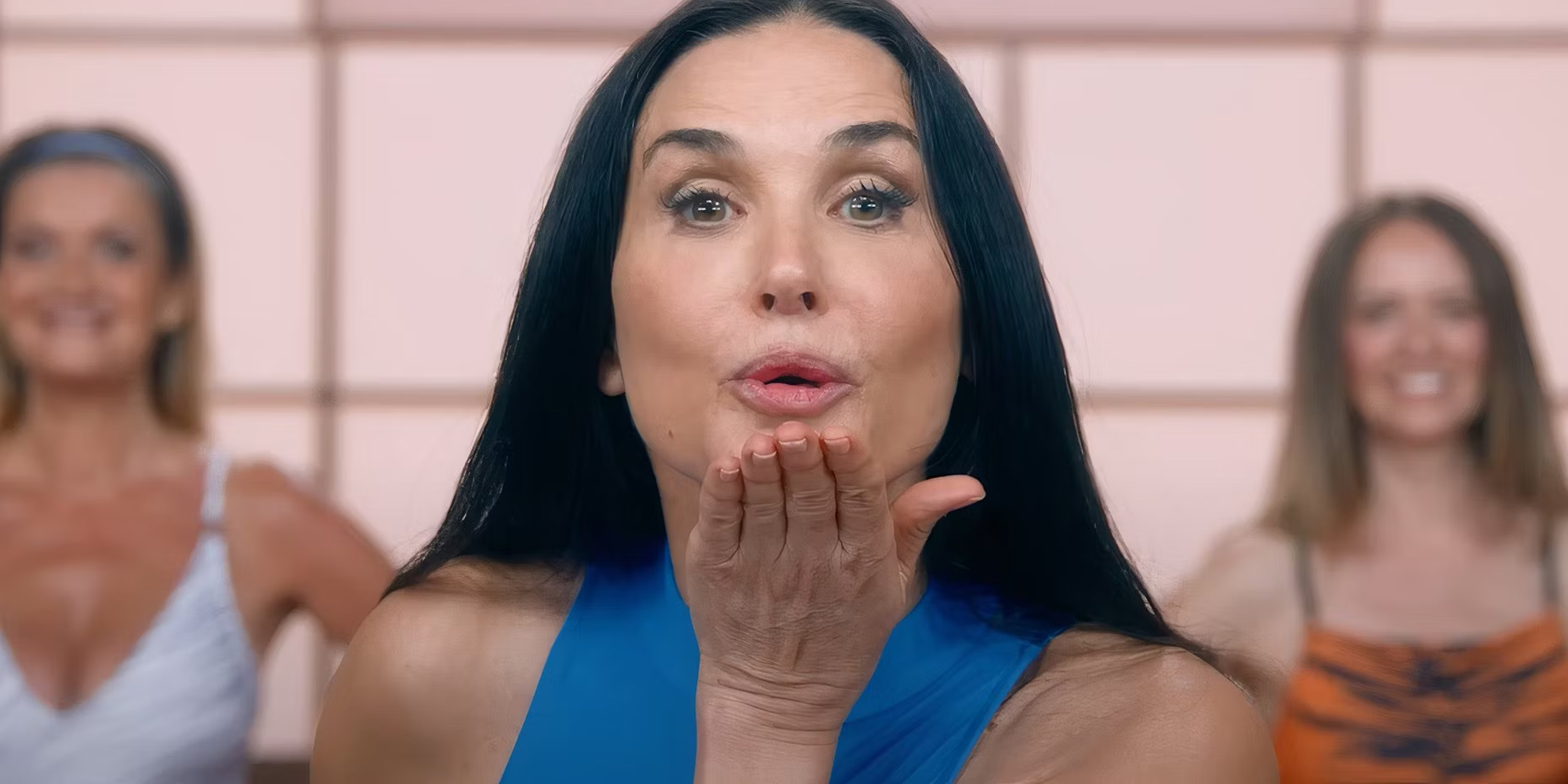Demi Moore blowing a kiss in the substance
