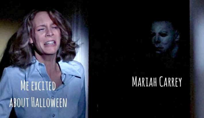 Halloween meme with a woman cowering behind a door from a killer. Text on top of her says "me excited about Halloween" and over him says, "Mariah Carrey."