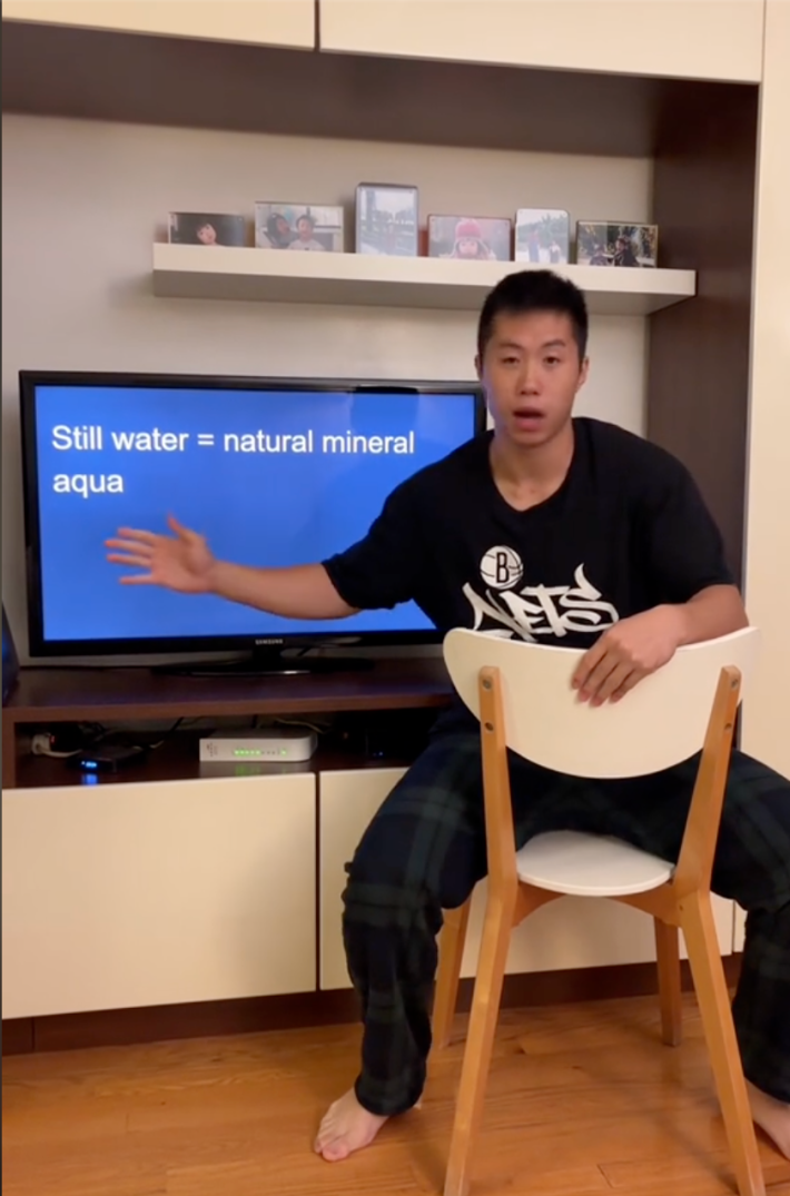 still water meme tiktok screenshot with a man pointing at a television screen reading, "still water = natural mineral aqua"