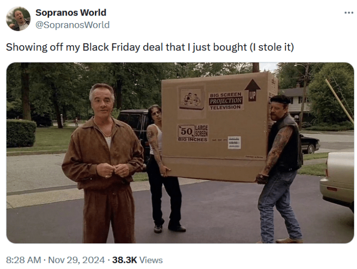 Tweet with a Sopranos screenshot of two men carrying a boxed big screen TV.
