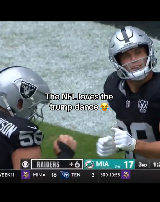 NFL players dancing with fist pumps on the field.