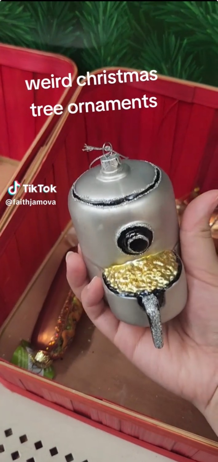 Gray air fryer ornament with gold in the fryer