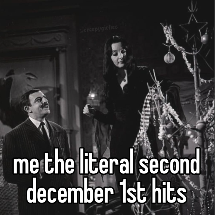 Addams Family putting up their Christmas tree. Text reads, "me the literal second december 1st hits."