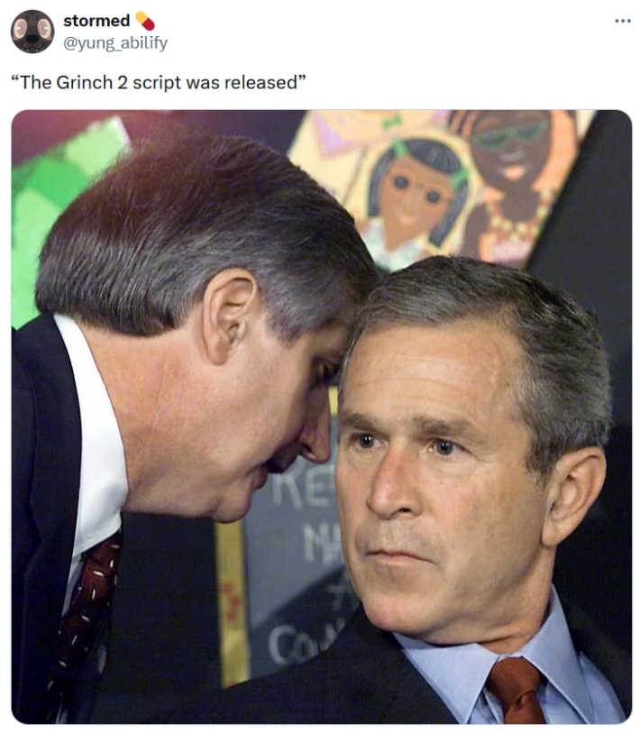 George W. Bush getting informed about 9/11 meme with the comment "The Grinch 2 script was released."