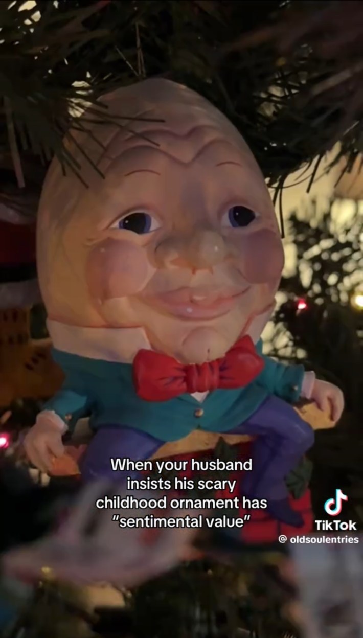 Suited Humpty Dumpty ornament with realistic wrinkles and full cheeks and lips