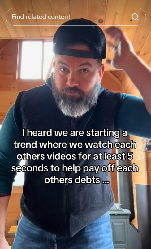 TikTok video of a man in a baseball cap and black vest with a caption about doing the watch videos to pay off people's debt trend.