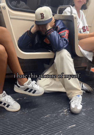TikTok photo of a college guy drunk on the floor of the train. Text overlay reads, "I hate this picture of myself."