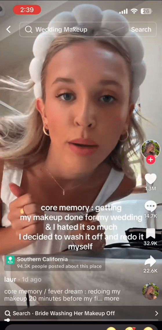 Bride leaning into the camera about to remove her professional makeup 20 minutes before her first look photos.