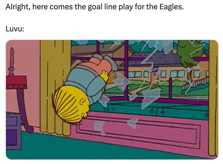 Eagles Super Bowl meme, text reads, "Alright, here comes the goal line play for the Eagles. Luvu:" with a photo of Ralph Wiggum from the Simpsons diving headfirst through a house's window.