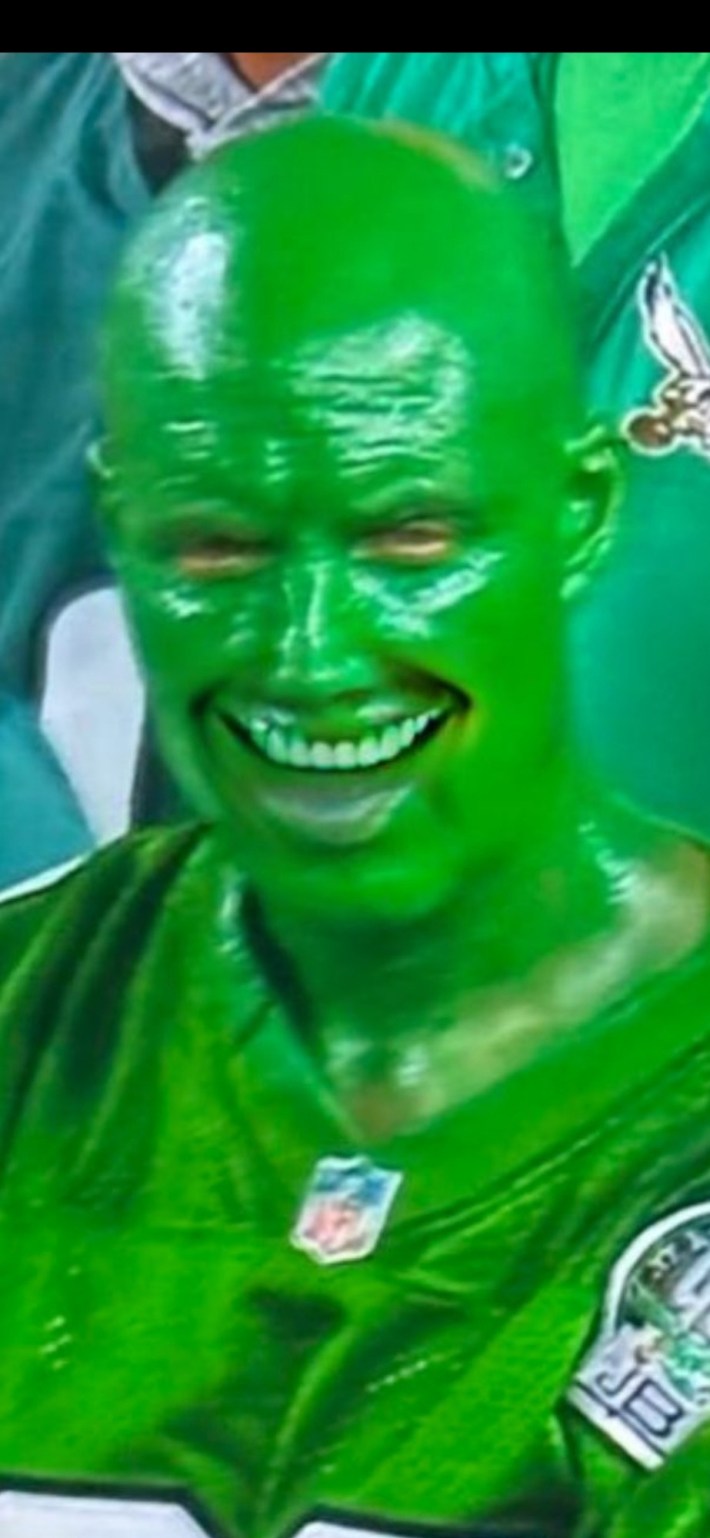 Eagles Super Bowl meme of a bald man painted all green grinning for the camera.