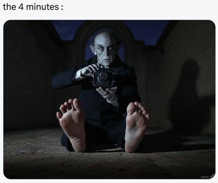 Nosferatu extended cut reaction, text reads, "the 4 minutes:" with an AI-generated photo of a Nosferatu-like person holding an old camera with his feet sticking straight out to the viewer.