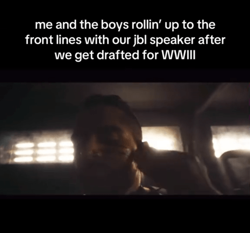 Fetty Wap JBL Speaker meme showing a man wiping black stripes onto his cheeks in a dim vehicle.