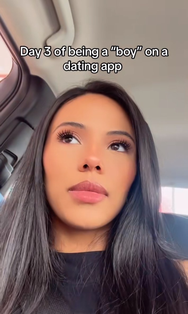 TikTok video of a woman sitting in her car. Text overlay reads, "Day 3 of being a 'boy' on a dating app."