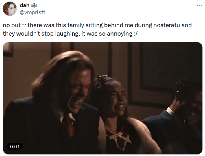 Tweet with a gif of characters from Interview with a Vampire laughing.
