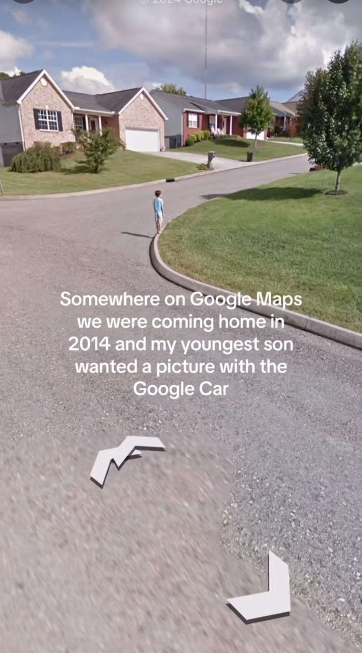 Somewhere on Google trend screenshot of a little boy standing still for a photo with the Google street-view car. Text overlay reads, "Somewhere on Google Maps we were coming home in 2014 and my youngest son wanted a picture with the Google Car."