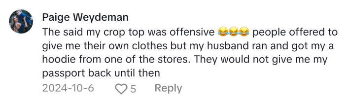 TikTok comment about Spirit Airlines dress coding. Text reads, "The said my crop top was offensive (cry laughing emojis) people offered to give me their own clothes but my husband ran and got my a hoodie from one of the stores. They would not give me my passport back until then"