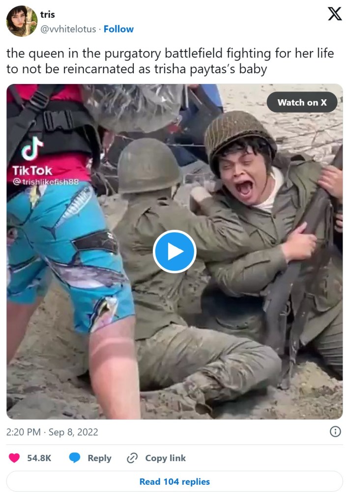 trisha paytas war meme that reads "the queen in the purgatory battlefield fighting for her life to not be reincarnated as trisha paytas’s baby"