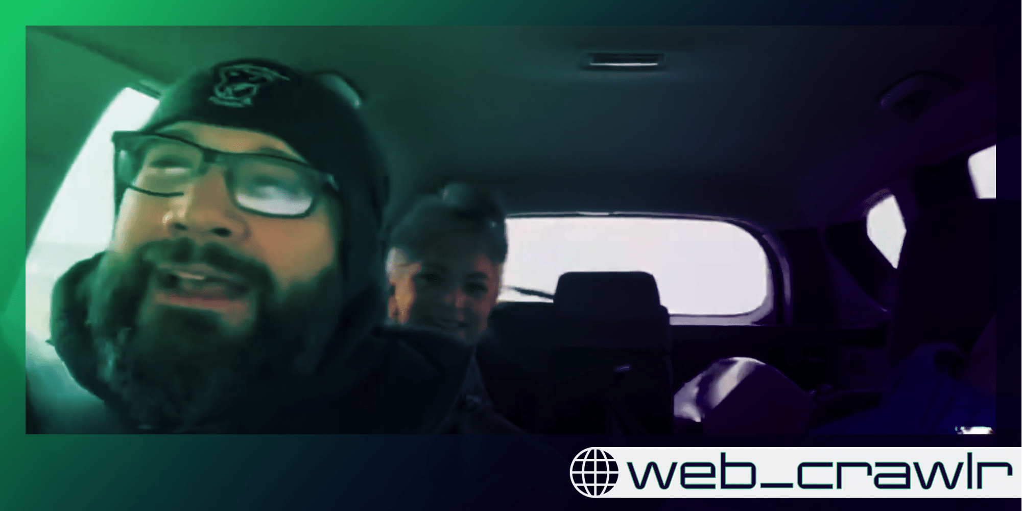 Two people in a car. The Daily Dot newsletter web_crawlr logo is in the bottom right corner.