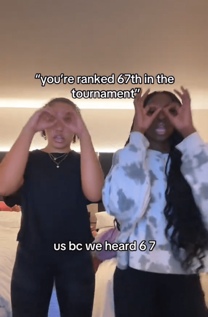 Two girls dancing holding their fingers like glasses. Text overlay reads, "you're ranked 67th in the tournament. / us bc we heard 6 7"