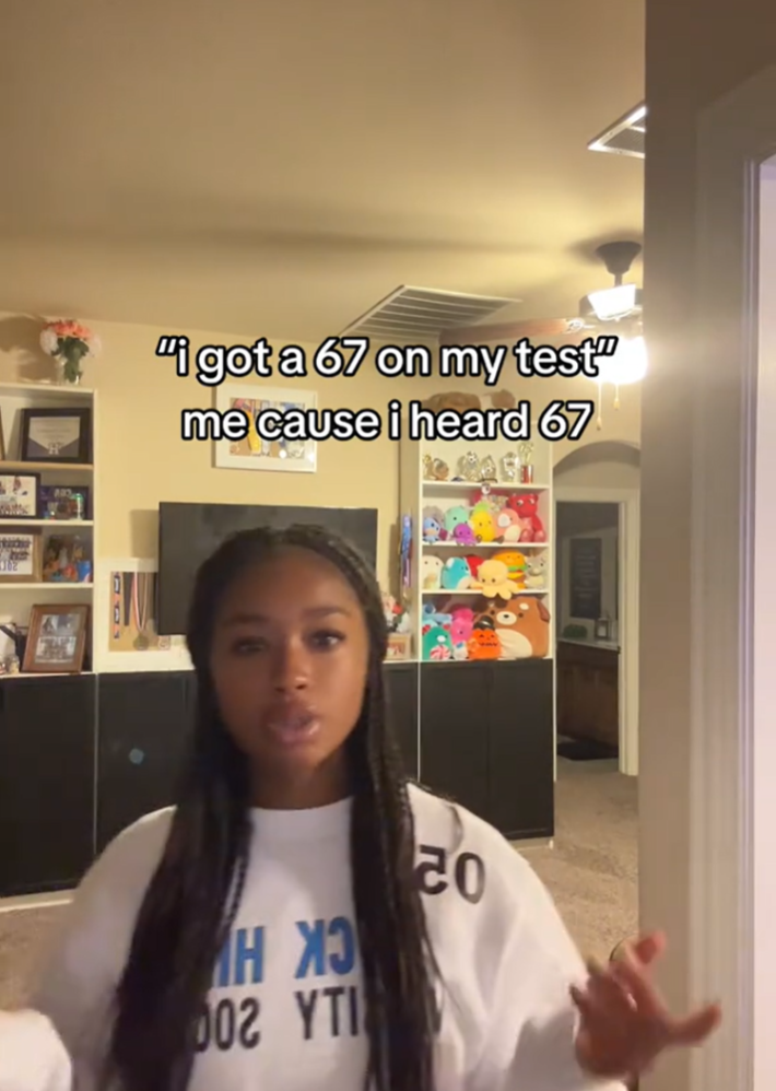 Woman lipsyncing. Text reads, "i got a 67 on my test / me cause i heard 67"