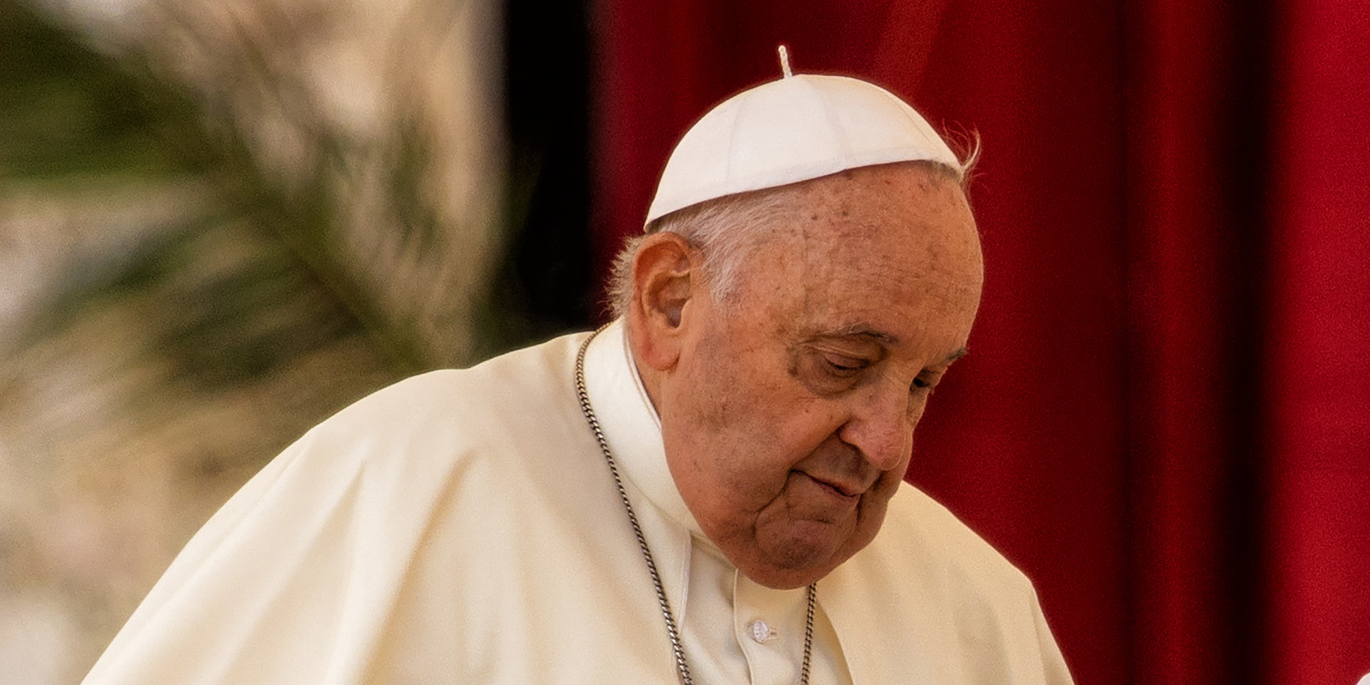 Pope Francis looking down.