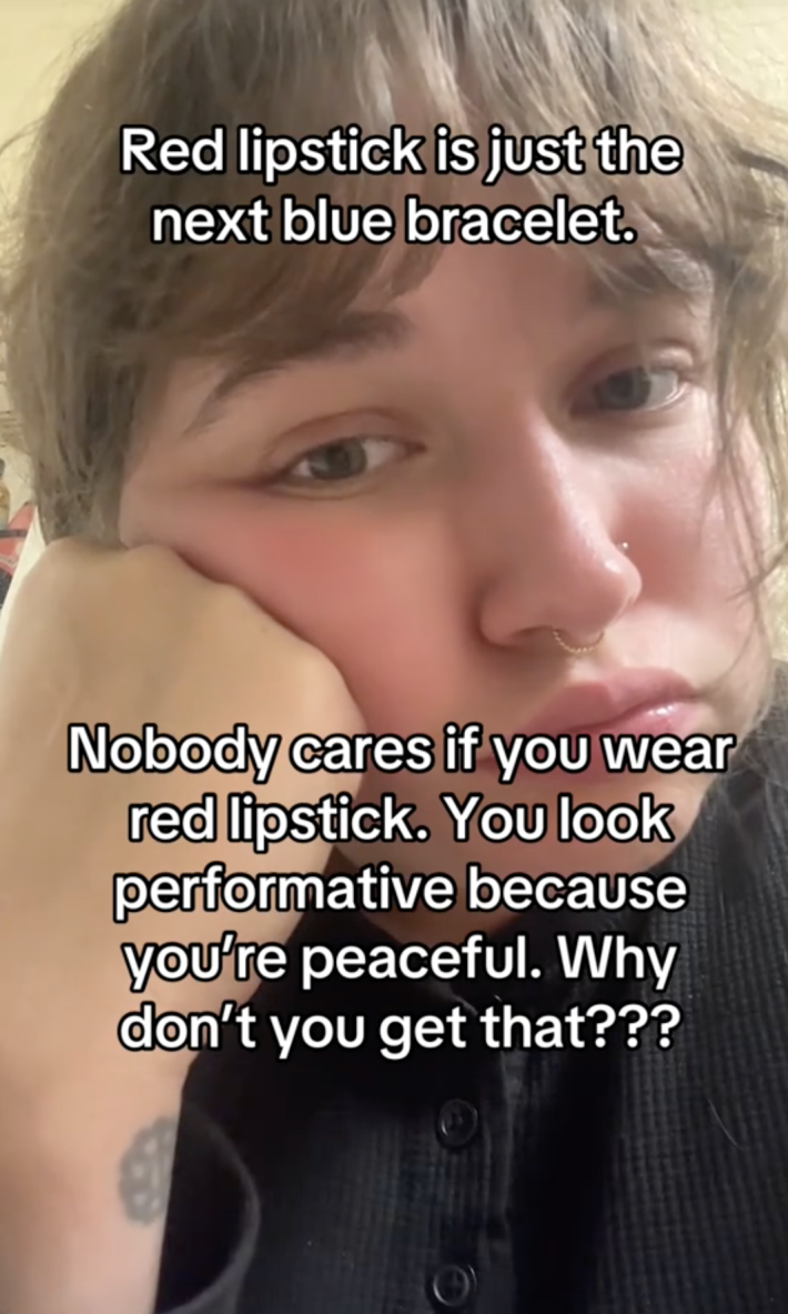 A still from TikTok user @elizabethjeannel criticising the red lipstick movement.