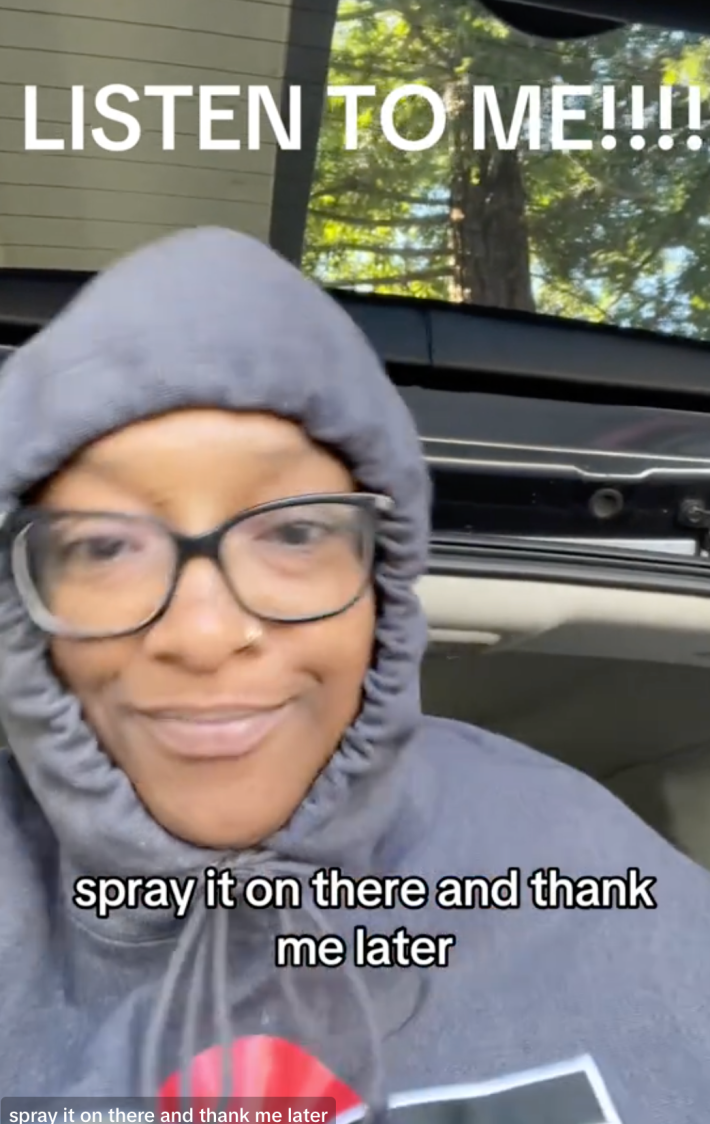 A woman spreading the benefits of Avocado pits and alcohol on her tiktok account