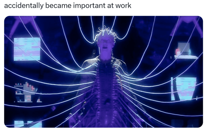 "accidentally became important at work n its ruining my life" meme with a photo of a person attached to dozens of cables.